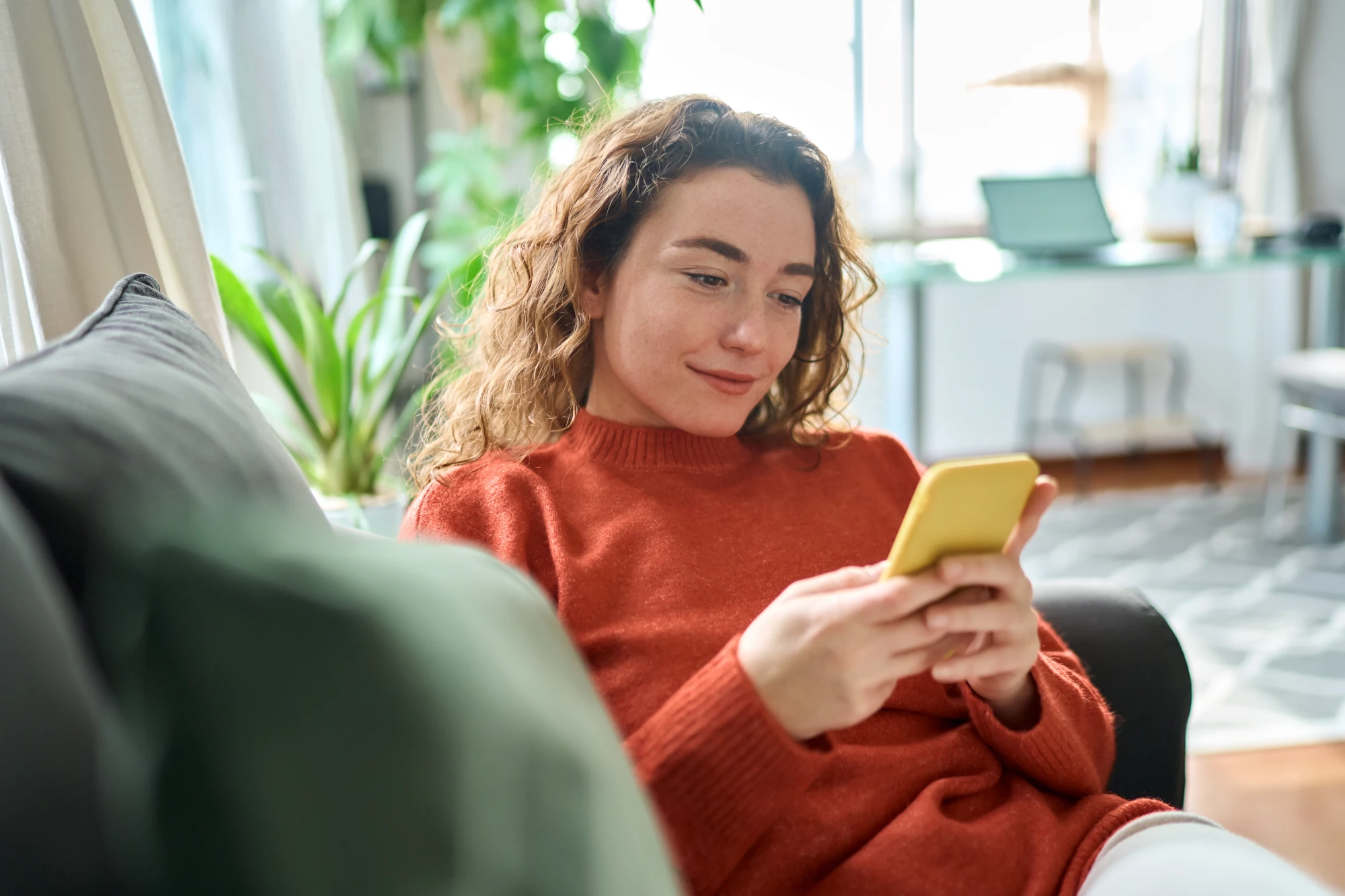 Woman resting at home after an EMDR therapy session