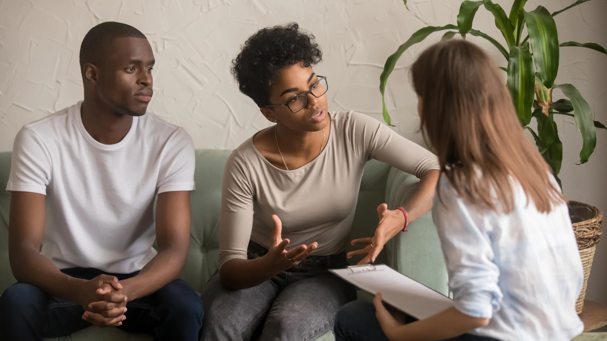 Loved ones having a calm conversation about alcohol addiction and treatment.